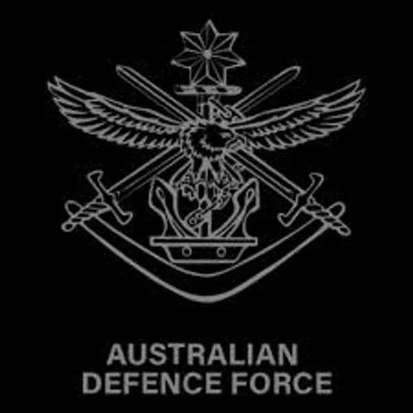 Australian Defence Force emblem featuring an eagle with outstretched wings, a crown, anchor, and crossed swords, with “AUSTRALIAN DEFENCE FORCE” written below on a black background.